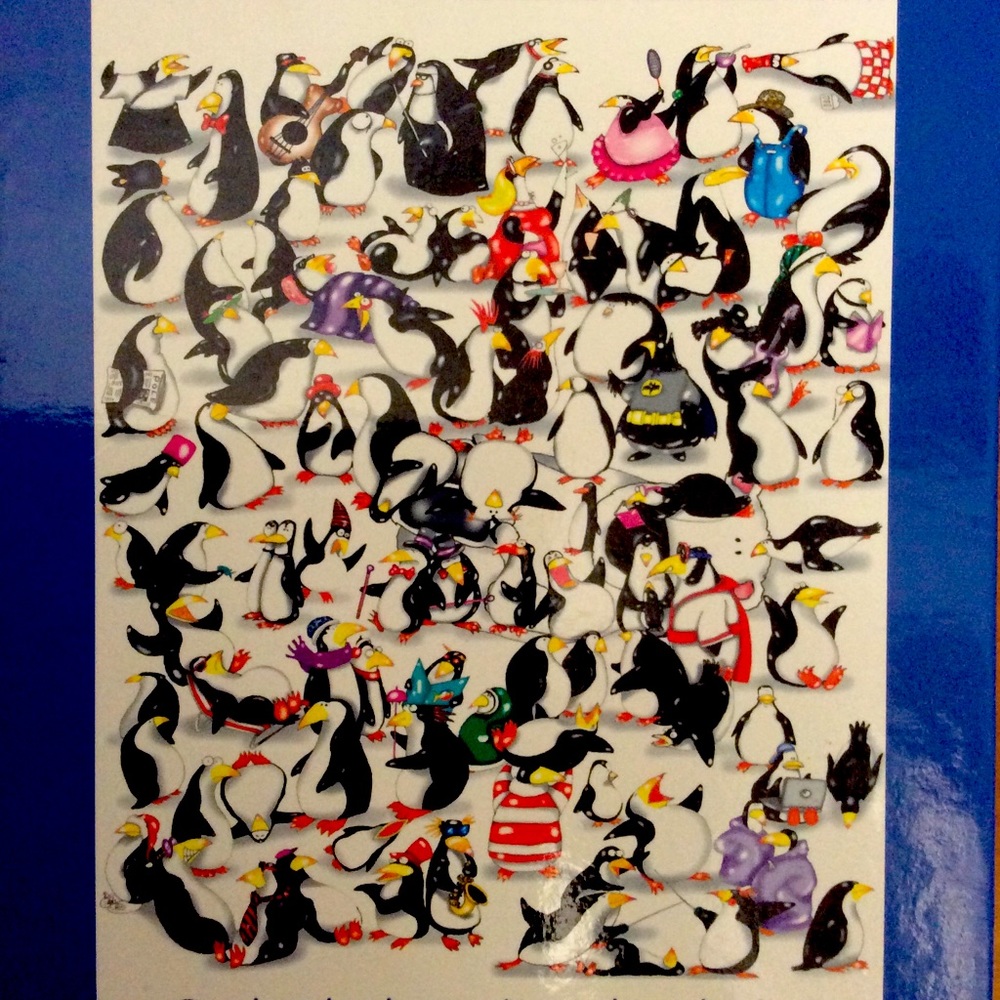 One hundred penguins and a polar bear
